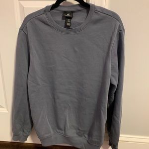 blue crewneck sweatshirt